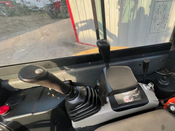 Inside cab of Komatsu PC26 Mini Digger for sale UK